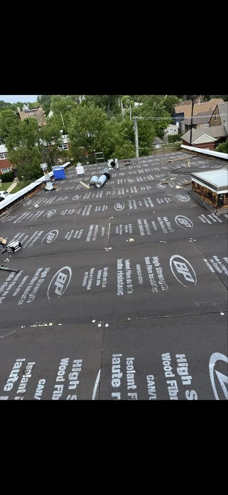 Slide of Nicholas Roofing & Tuckpointing