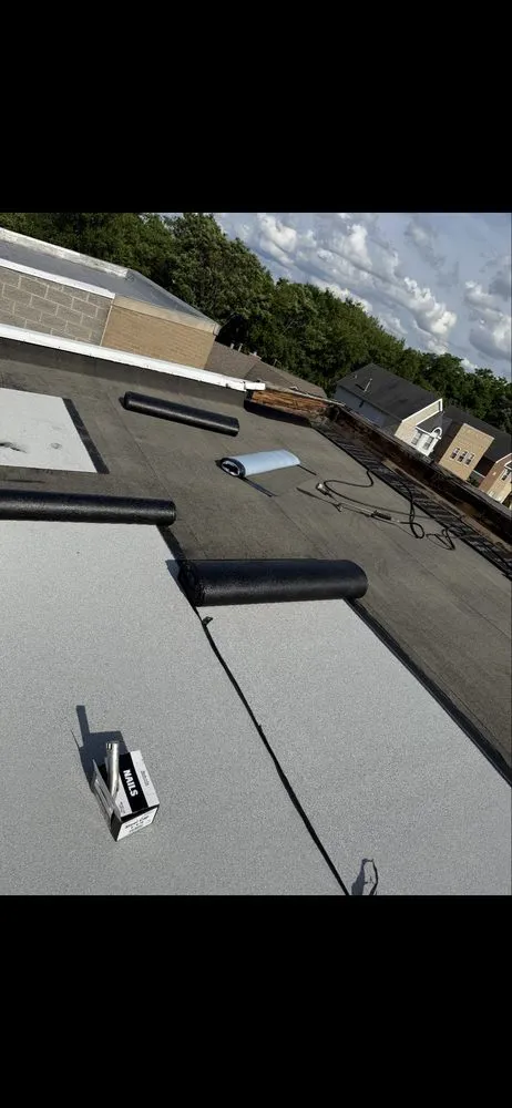 Slide of Nicholas Roofing & Tuckpointing