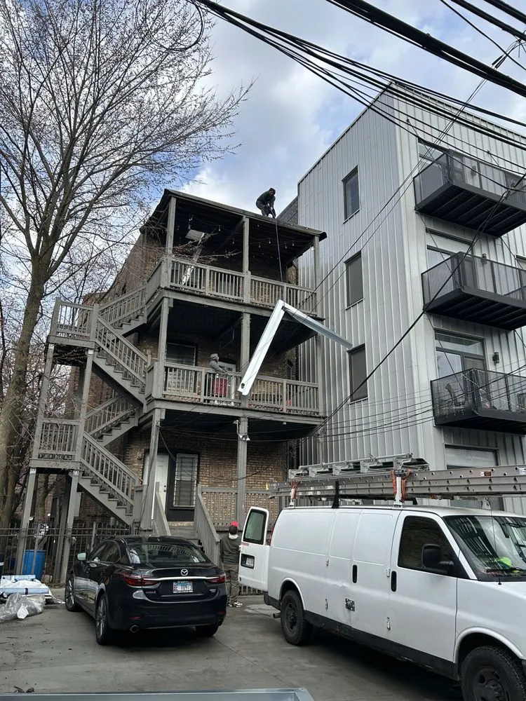 Slide of Nicholas Roofing & Tuckpointing