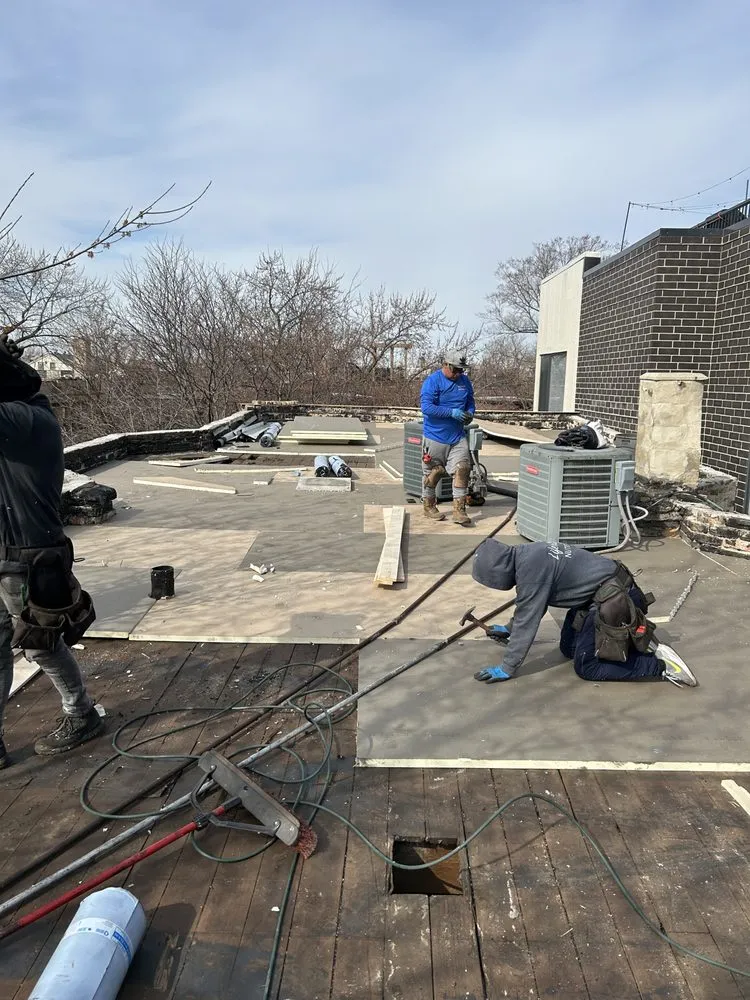 Slide of Nicholas Roofing & Tuckpointing