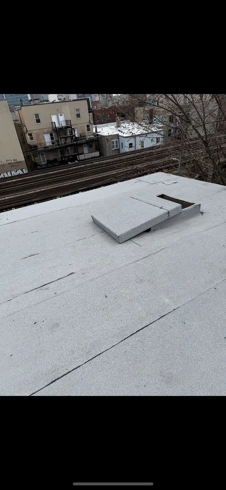 Slide of Nicholas Roofing & Tuckpointing