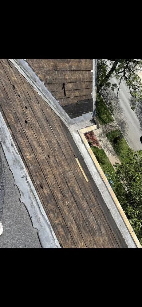 Slide of Nicholas Roofing & Tuckpointing