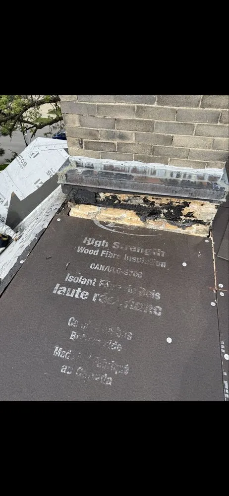 Slide of Nicholas Roofing & Tuckpointing