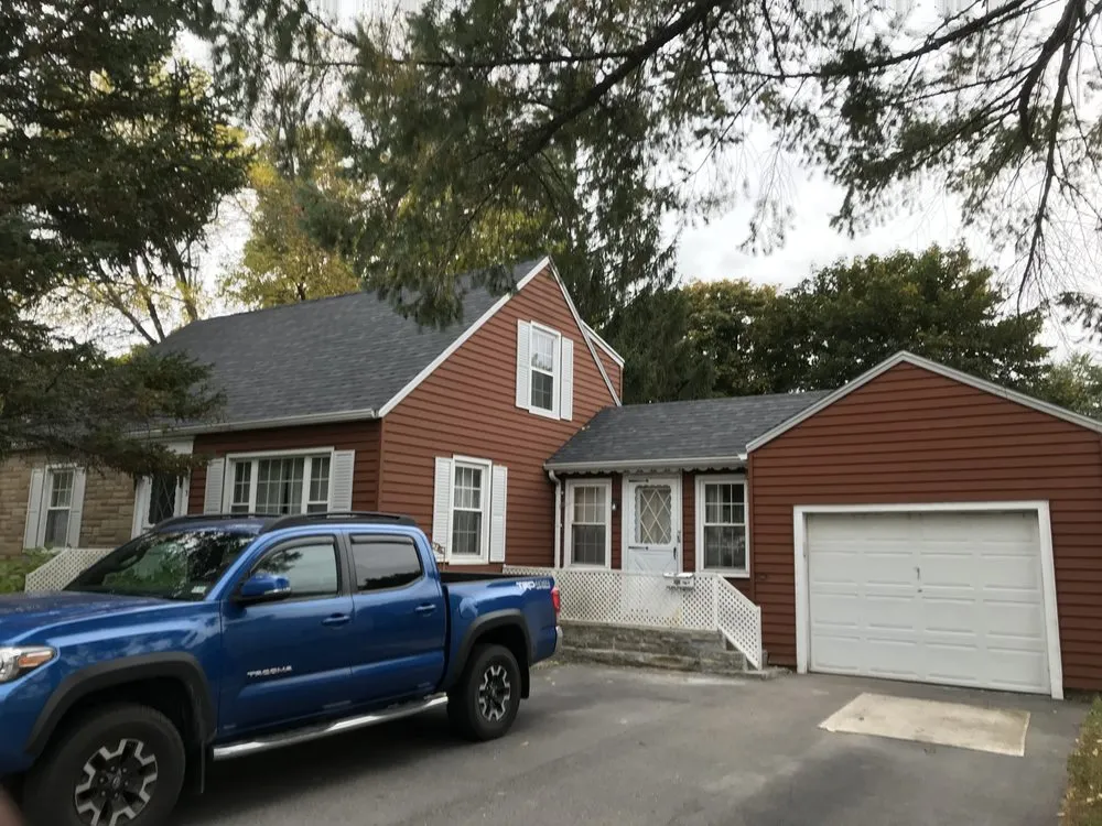 Slide of Nick Tracey Roofing