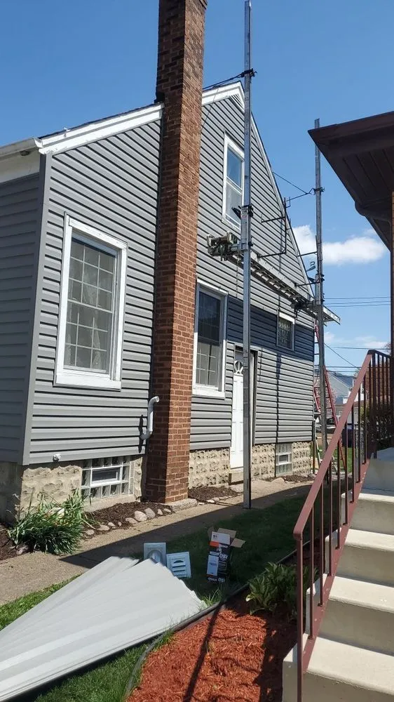 Slide of Nick's Roofing & Siding