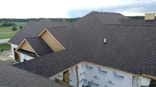 Slide of Nick's Roofing & Siding