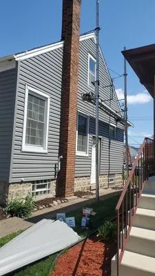 Nick's Roofing & Siding Logo