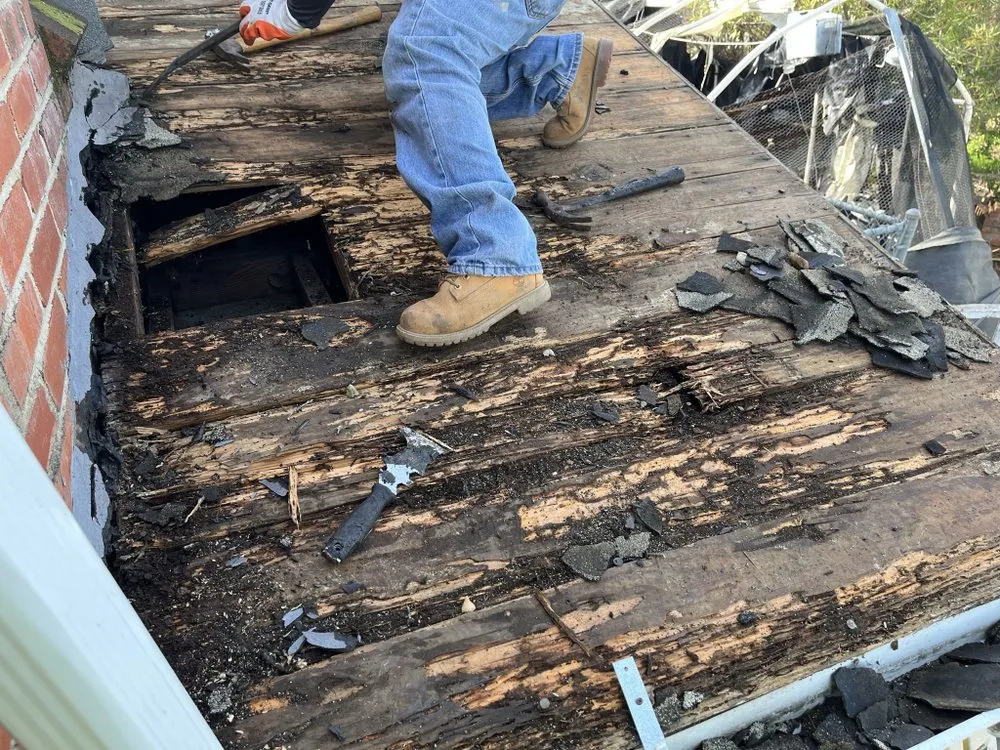 Slide of Nicks roofing and tree services