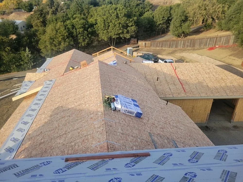 Slide of Nick’s Roofing