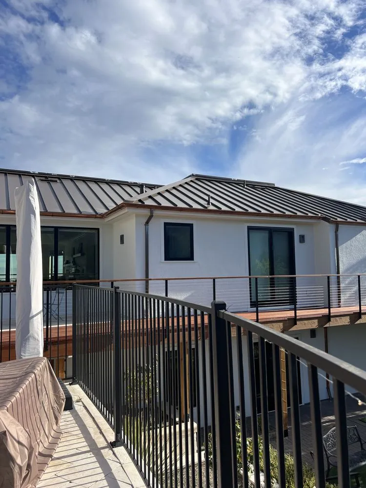 Slide of Nick’s Roofing