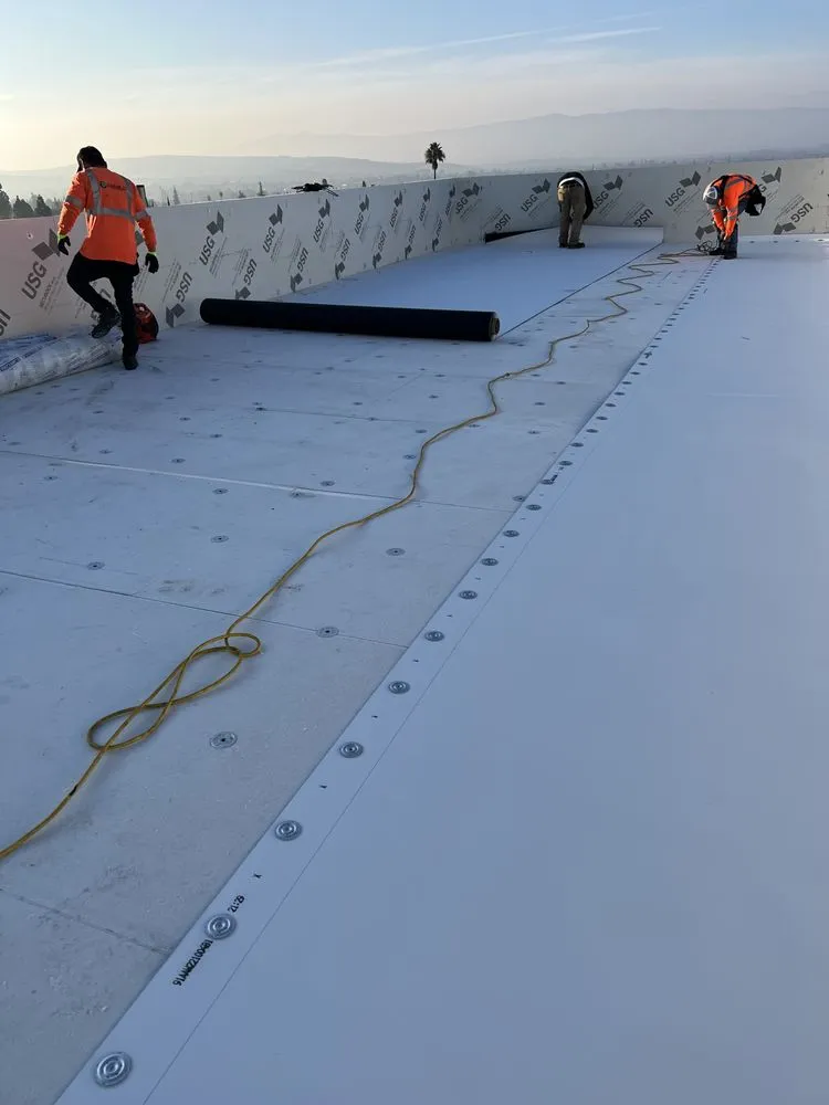 Slide of Nick’s Roofing