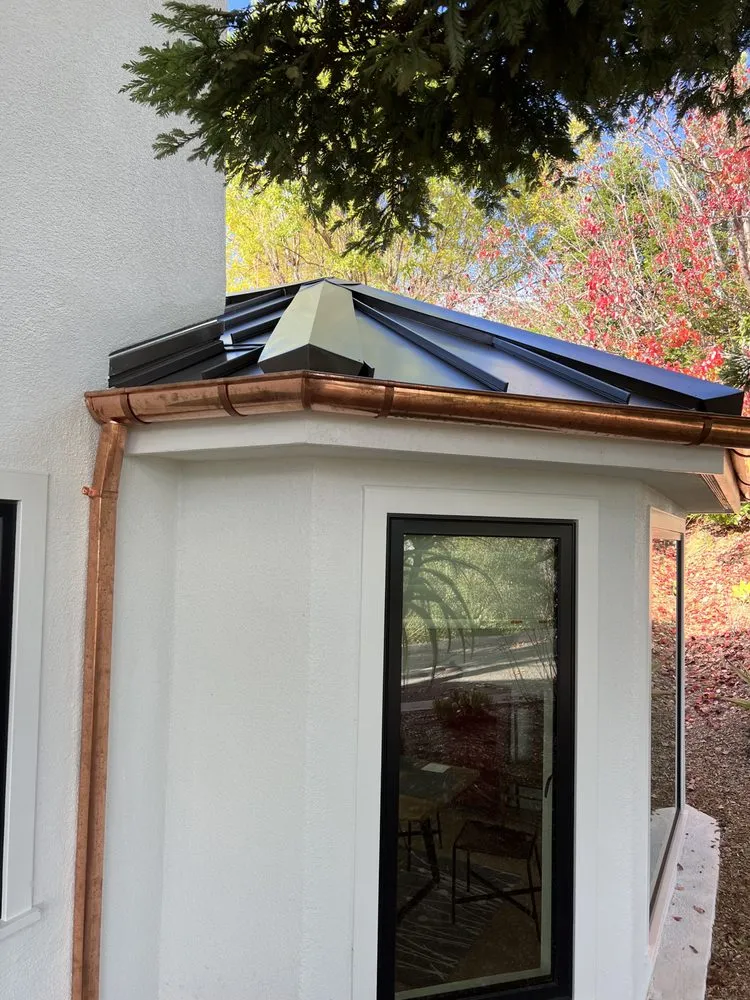 Slide of Nick’s Roofing