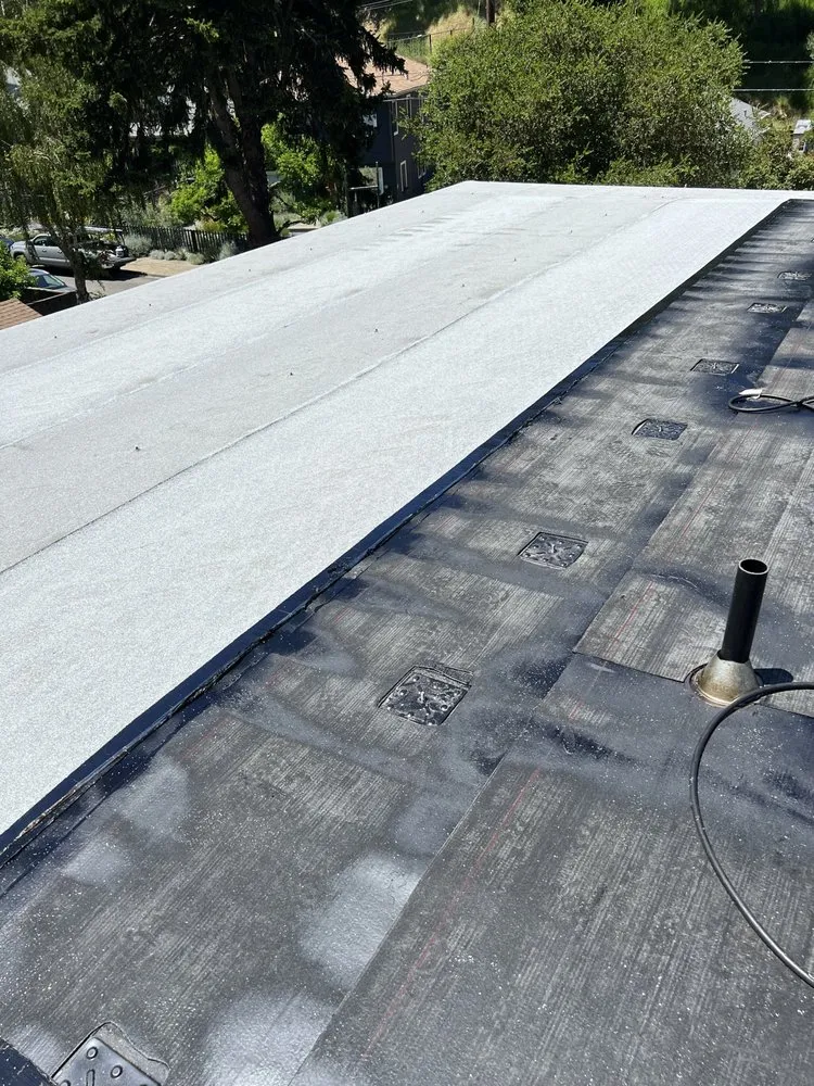 Slide of Nick’s Roofing