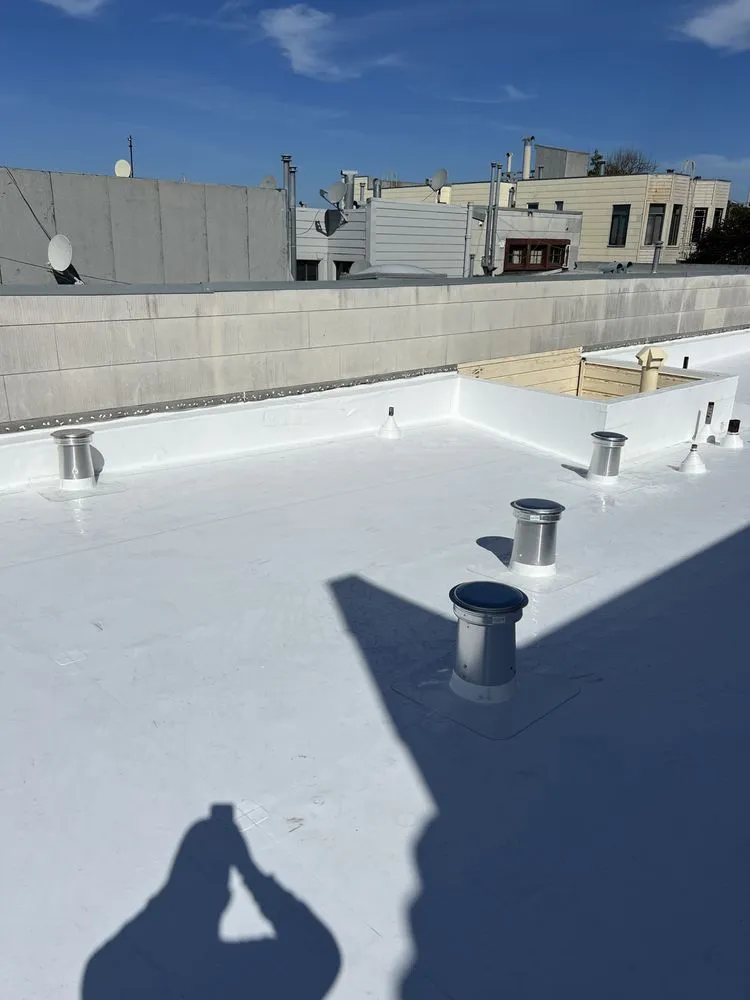 Slide of Nick’s Roofing