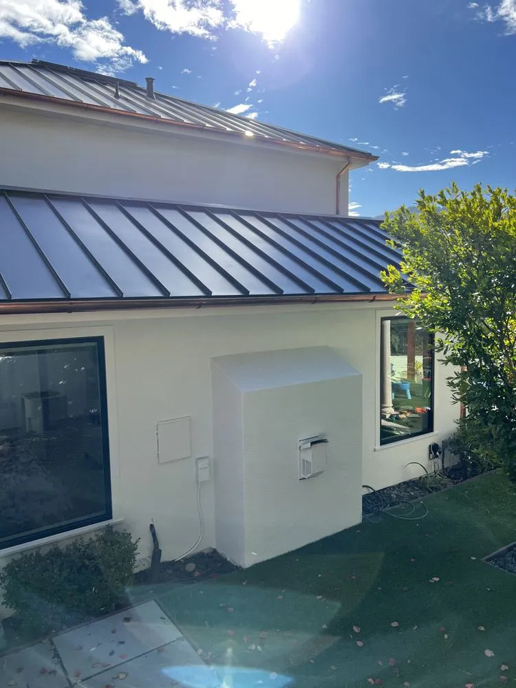 Slide of Nick’s Roofing