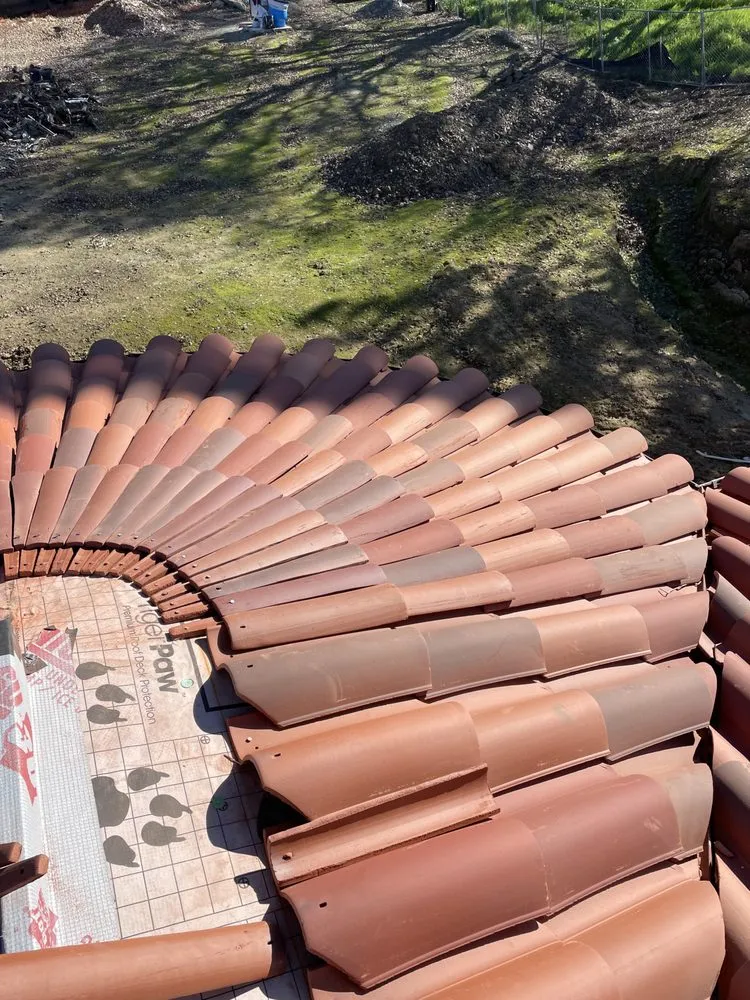 Slide of Nick’s Roofing