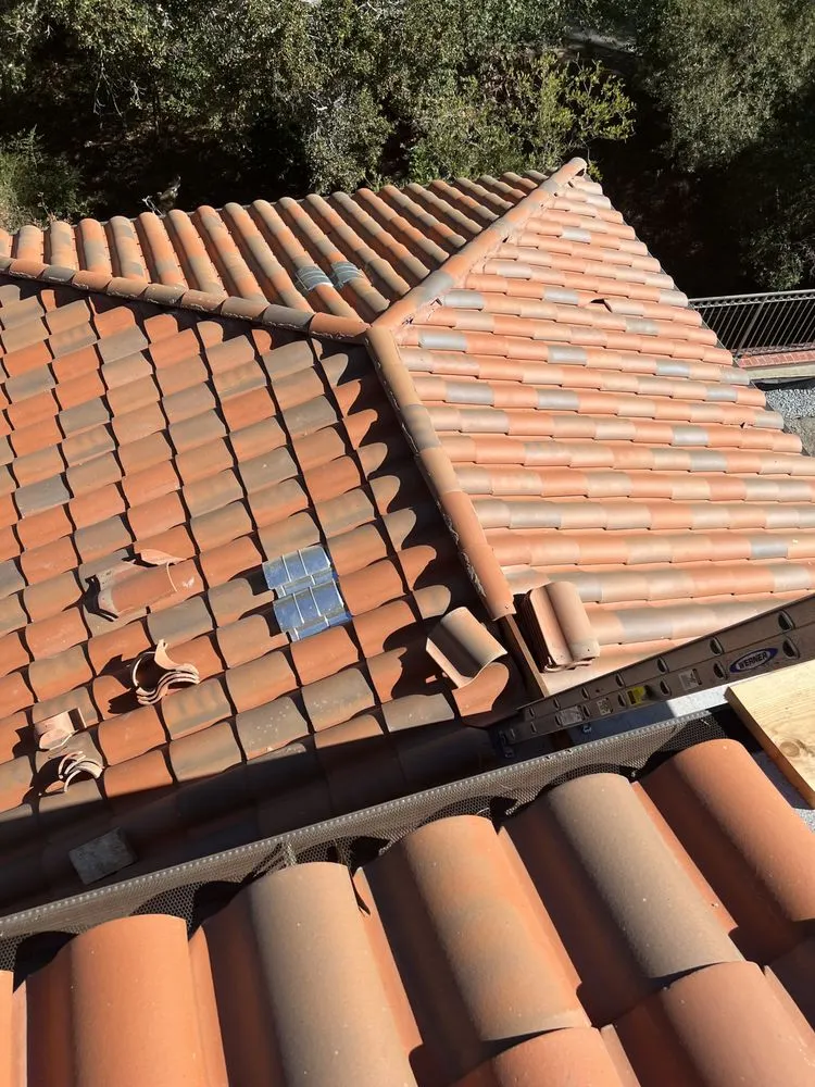 Slide of Nick’s Roofing