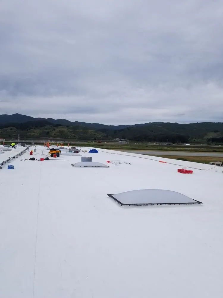 Slide of Nick’s Roofing