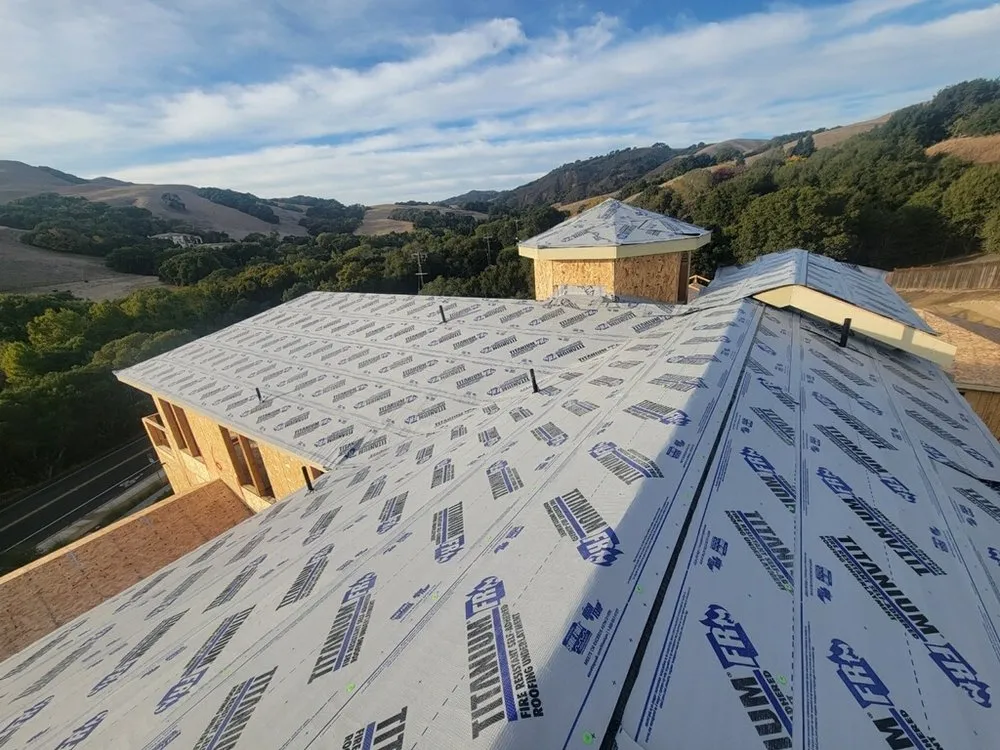 Slide of Nick’s Roofing