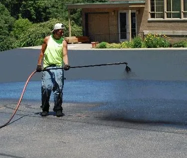 Slide of Nicky's Roofing and Sealcoating