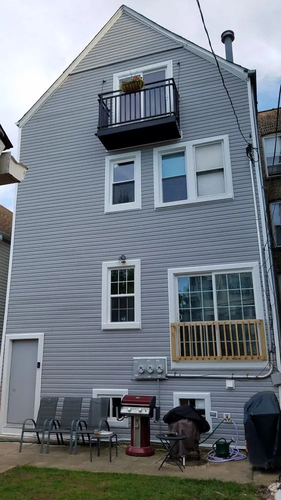 Slide of Nico Roofing & Exteriors