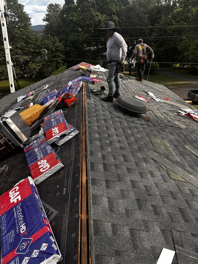 Slide of NJ Pro Painting Roofing & Carpentry