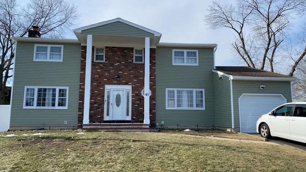 Slide of NJ Vinyl Siding and Roofing Contractors