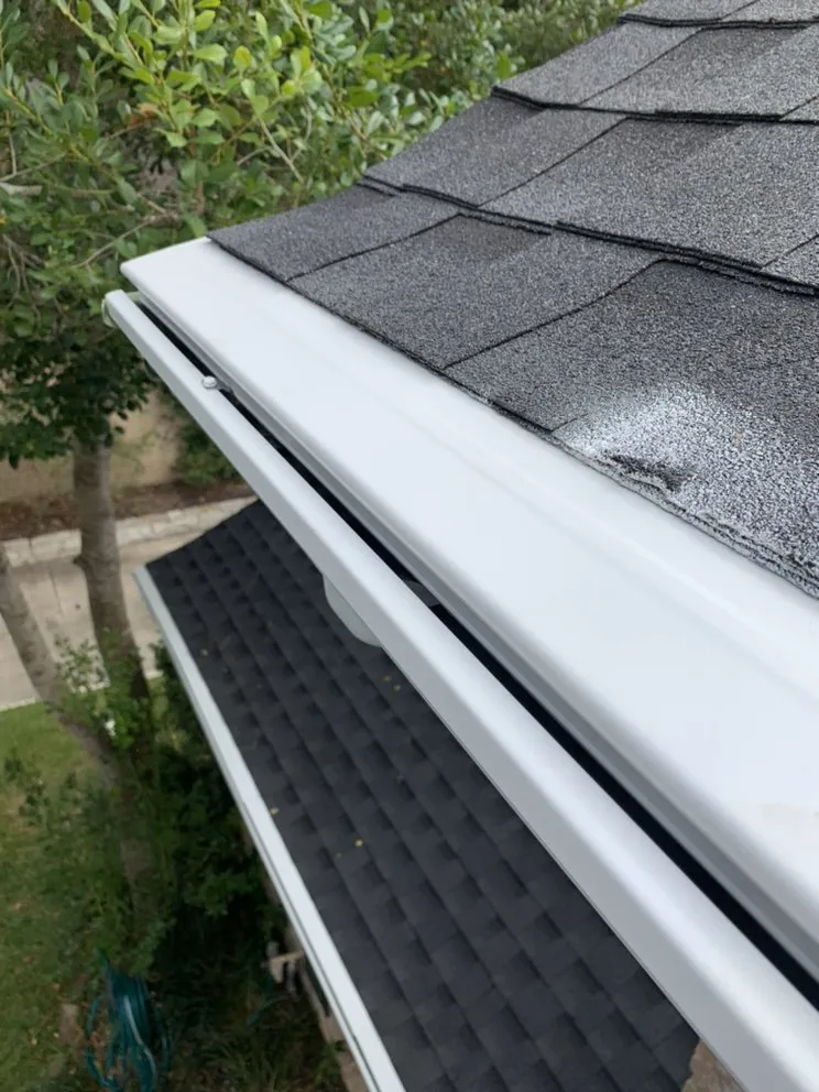 Slide of NL Strong Gutter & Roofing