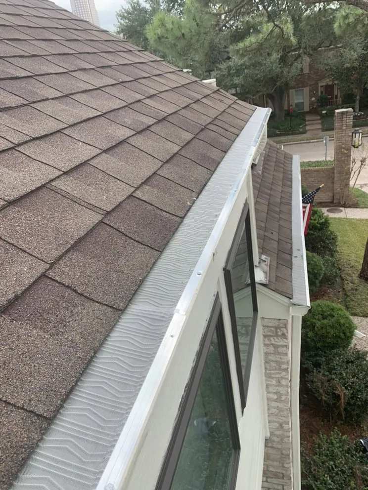 Slide of NL Strong Gutter & Roofing