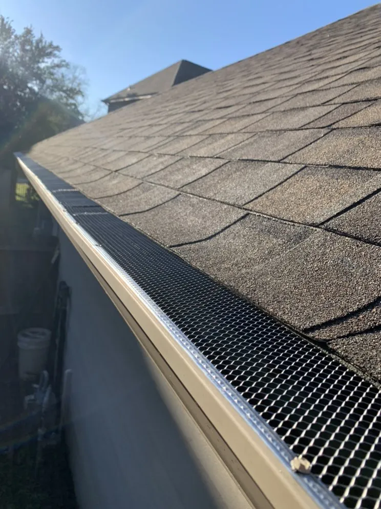 Slide of NL Strong Gutter & Roofing