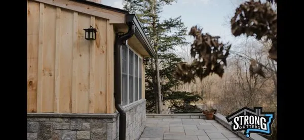 NL Strong Gutter & Roofing Logo