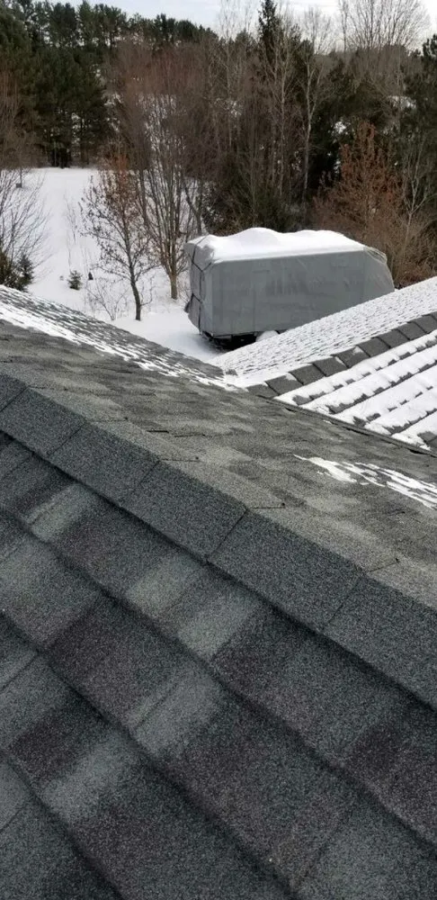 Slide of NM Roofing and Renovations