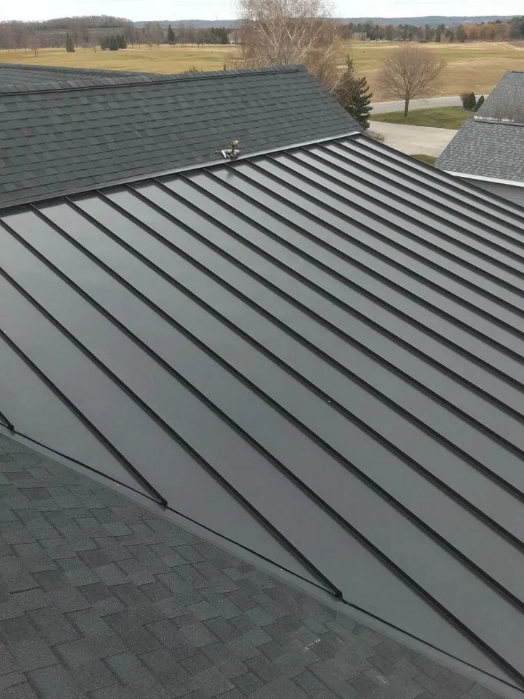 Slide of NM Roofing and Renovations