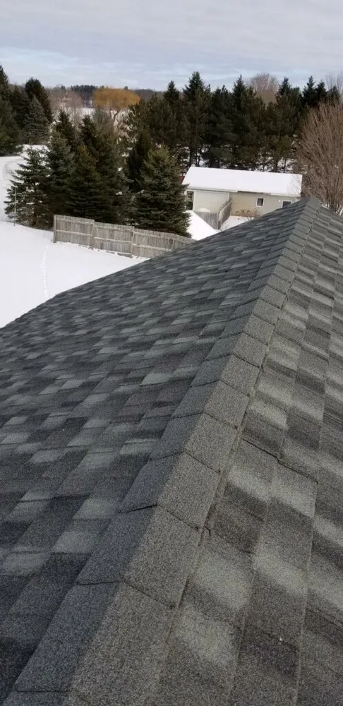 Slide of NM Roofing and Renovations