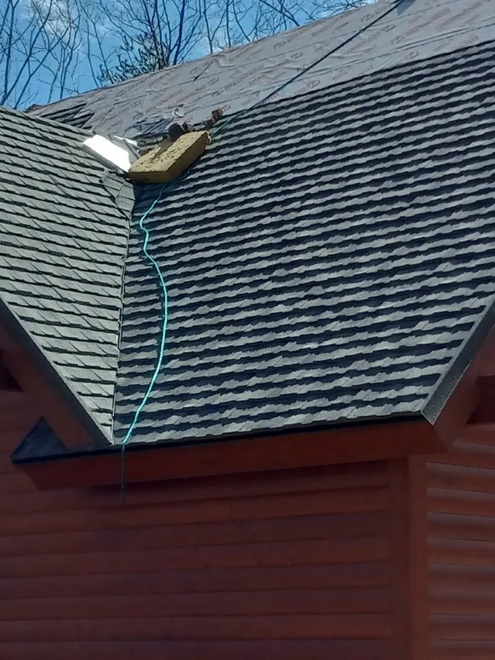 Slide of NM Roofing and Renovations