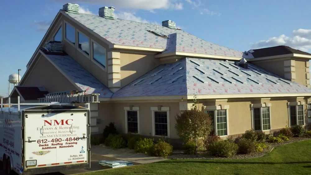 Slide of NMC Exteriors & Remodeling