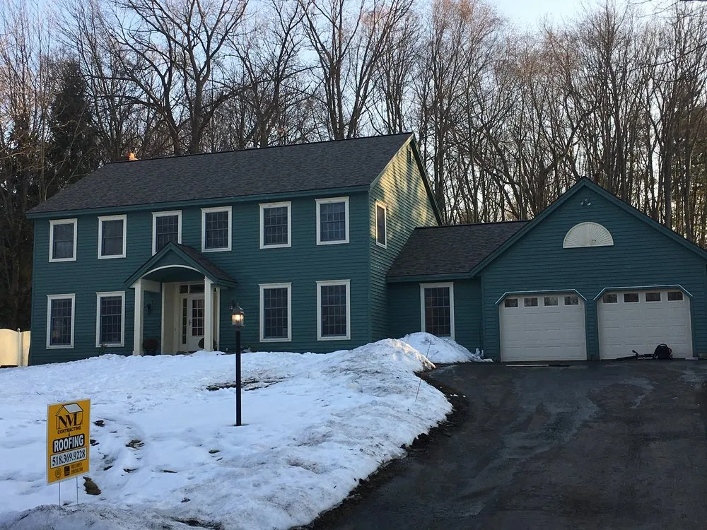 Slide of NML Contracting and Roofing