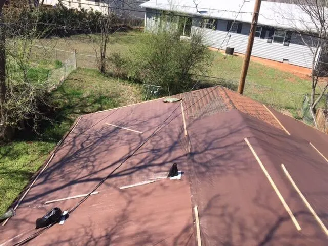 Slide of NMT Roofing