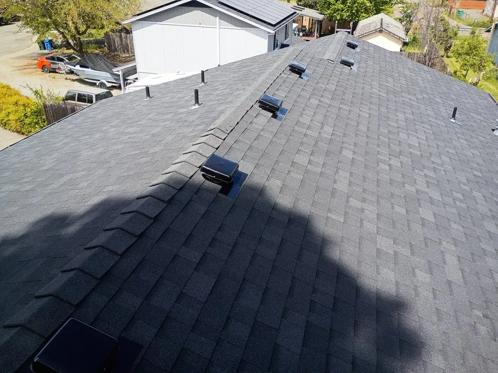 Slide of No Mas Roofing