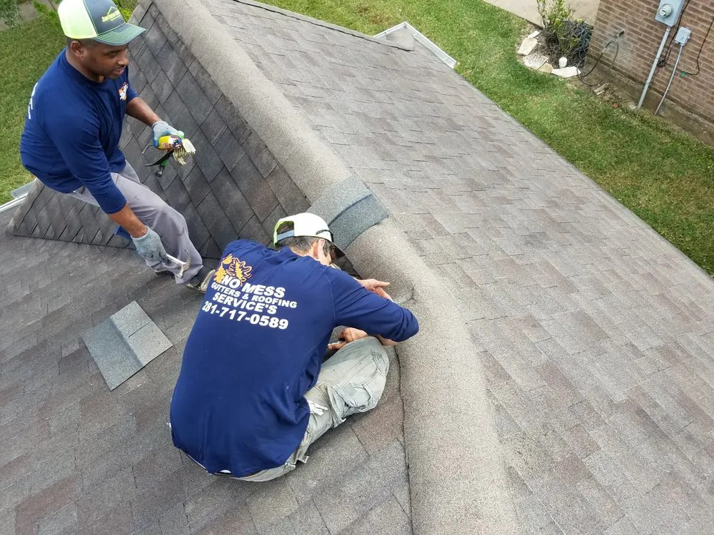 Slide of No Mess Gutters And Roofing Services