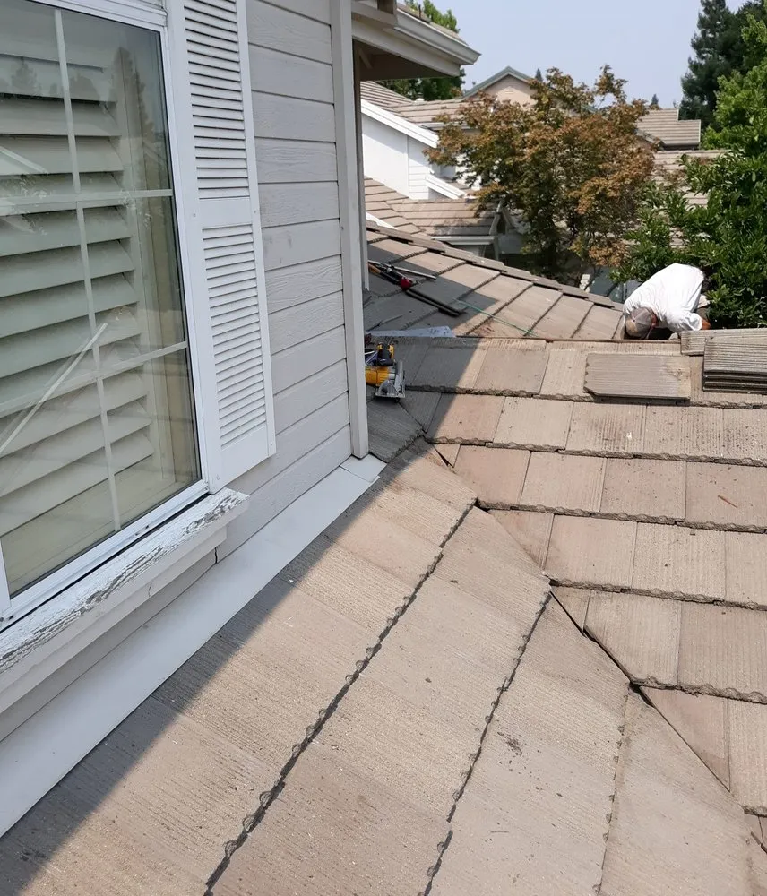 Slide of Noah's Roofing