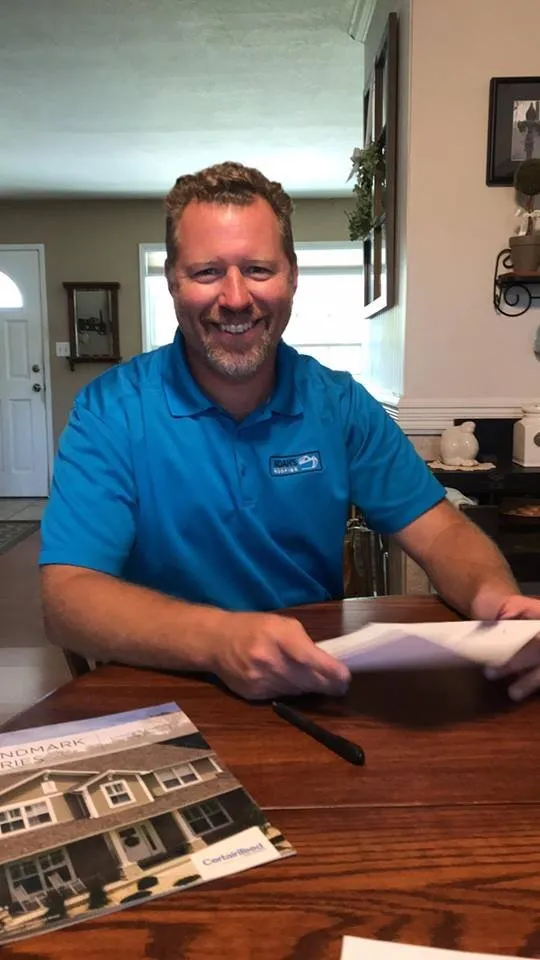 Slide of Noah's Roofing