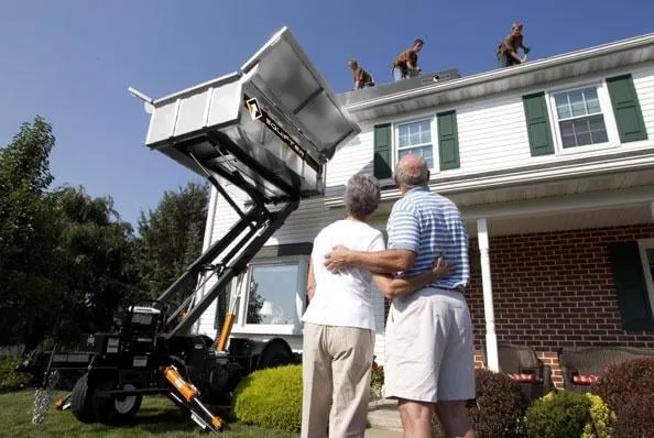 Slide of Noble Roofing Company