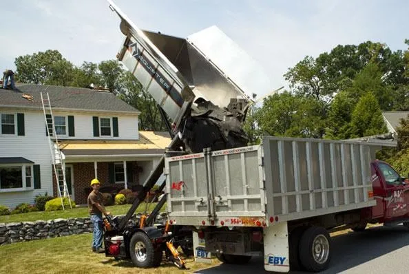 Slide of Noble Roofing Company