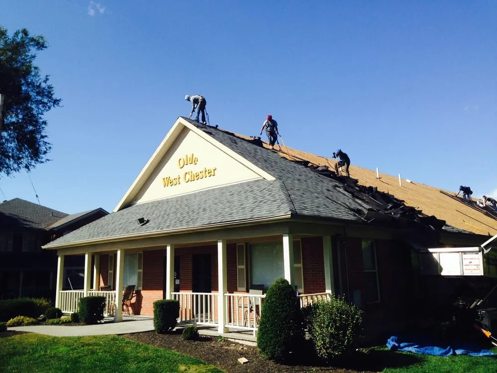 Slide of Noble Roofing Company