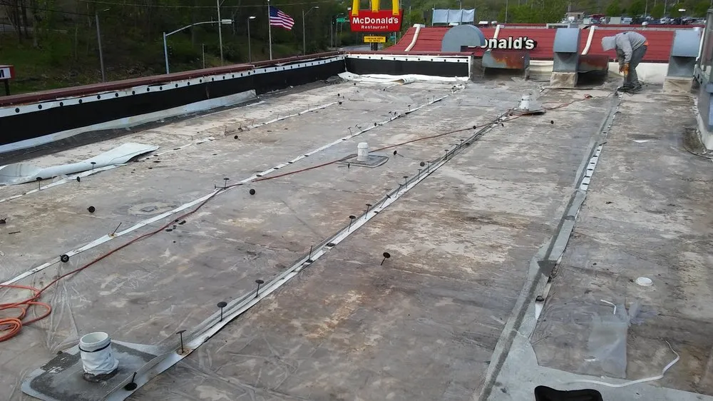 Slide of Noble Roofing