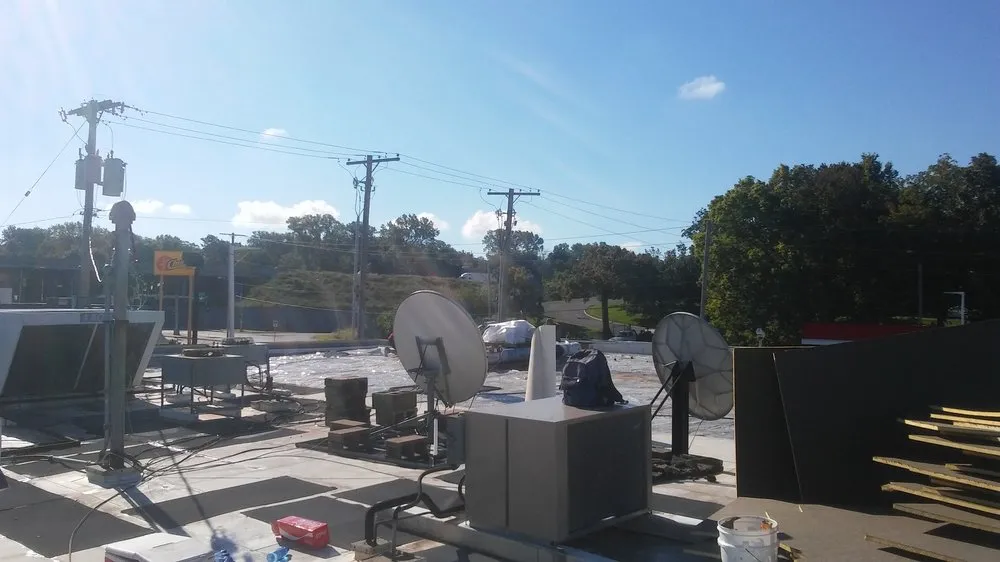 Slide of Noble Roofing