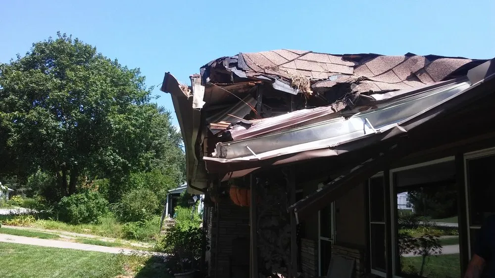 Slide of Noble Roofing