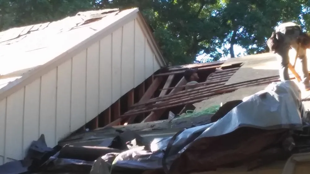 Slide of Noble Roofing