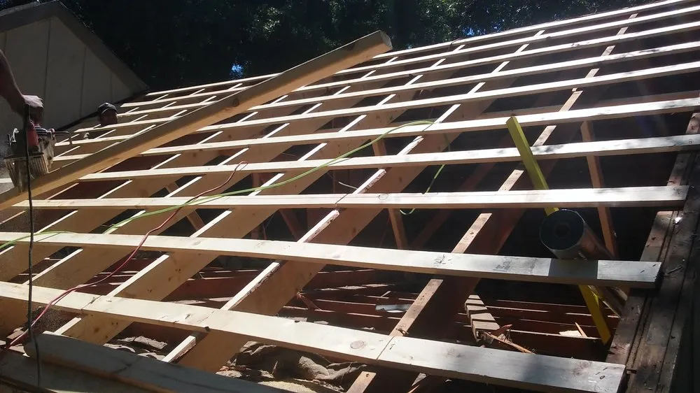 Slide of Noble Roofing